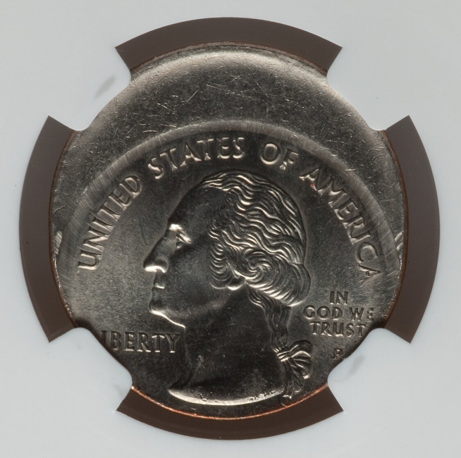 2015 quarter off-center strike error showing design shifted with blank planchet crescent visible